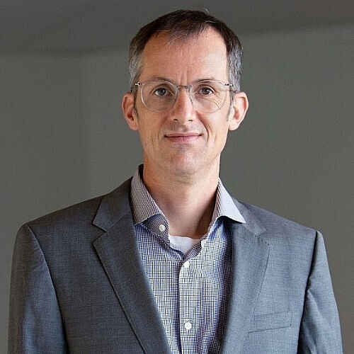 Glioma Progression is Shaped by Genetic Evolution and Microenvironment Interactions